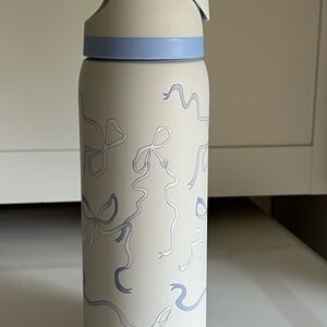 White and Blue Water Bottle with Ribbon